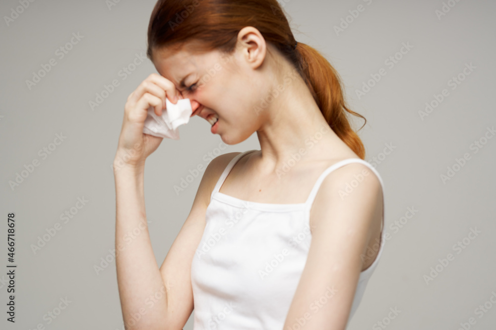 red-haired woman flu infection virus health problems close-up red-haired woman flu infection virus health problems close-up