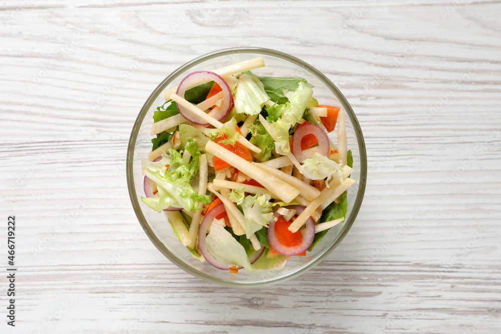 Delicious turnip salad served on white wooden table, top view Delicious turnip salad served on white wooden table, top view