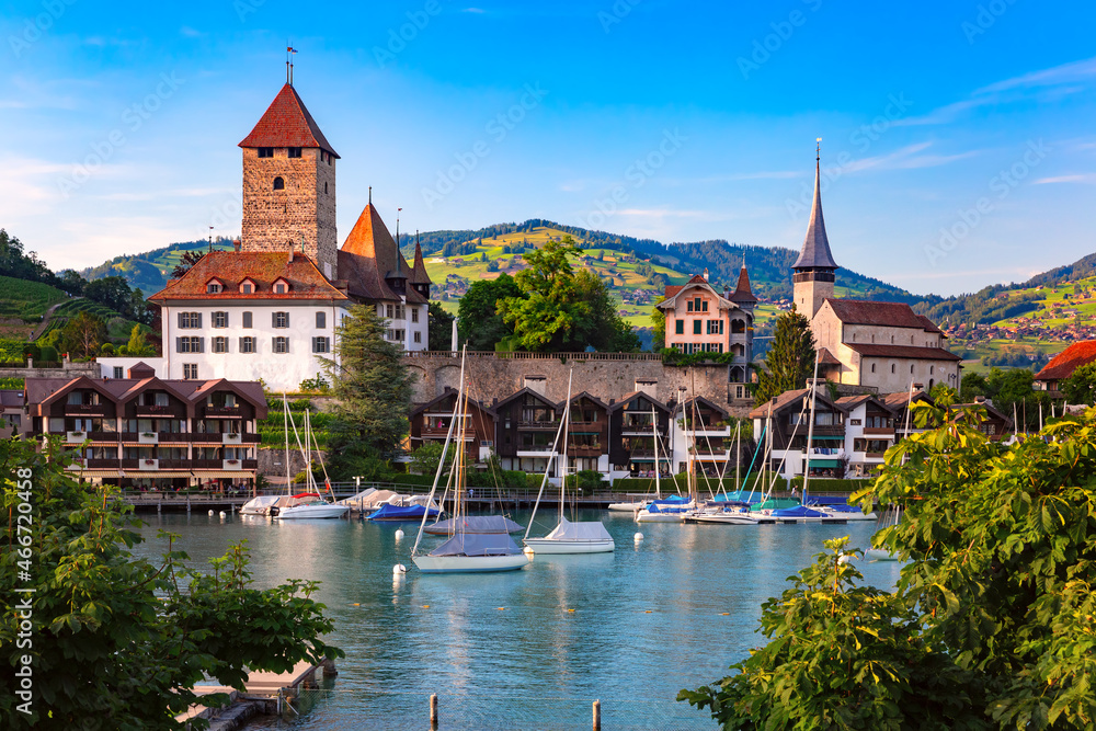 Spiez Church and Castle on the shore of Lake Thun in the Bernese Oberland region of the Swiss canton of Bern, Spiez, Switzerland.