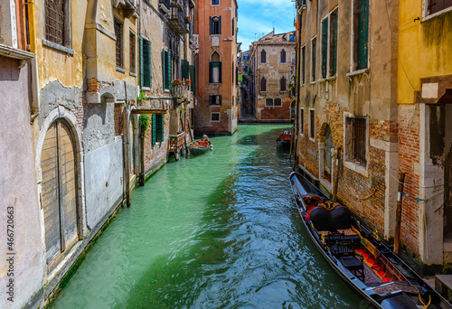 Narrow canal with gondola in Venice, Italy. Architecture and landmark of Venice. Cozy cityscape of Venice. © Ekaterina Belova