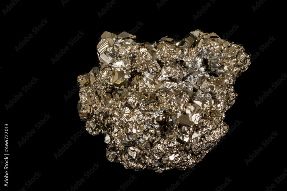 Macro mineral pyrite stone black background
