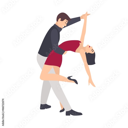 Beautiful pair of woman in red dress and elegant man dancing salsa. Young dan...