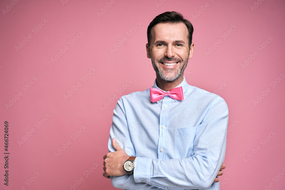 Studio shot portrait of middle aged caucasian smiling man Studio shot portrait of middle aged caucasian smiling man