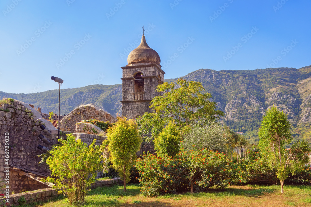 Fototapeta premium Religious architecture. Montenegro, Old Town of Kotor. Belfry of Saint Clare church on sunny autumn day. View from Town Wall