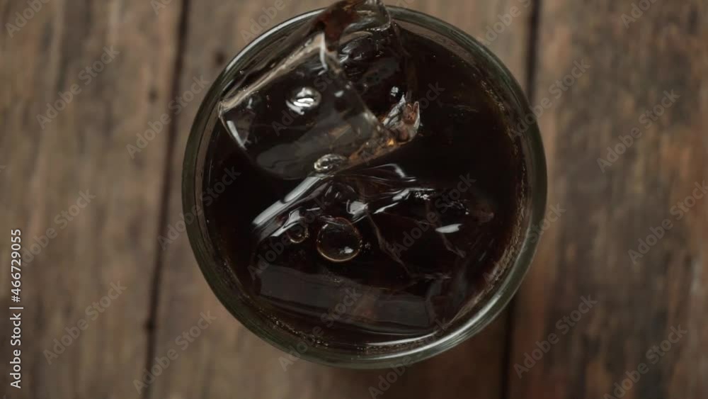 FHD formate, Solt drink being poures into a glass with ice FHD formate, Solt drink being poures into a glass with ice