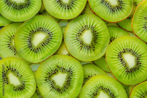 Kiwi Macro,Fresh Kiwi fruit sliced use for background,slice of kiwi fruit on a full frame. horizontal format