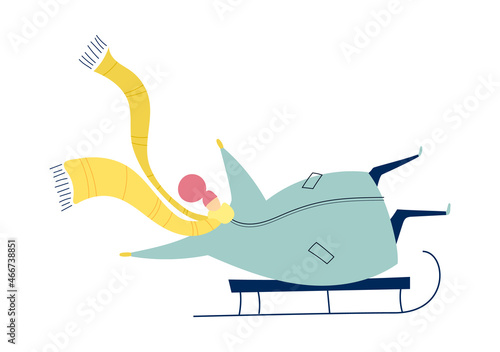 Personage in a long scarf sledding in winter