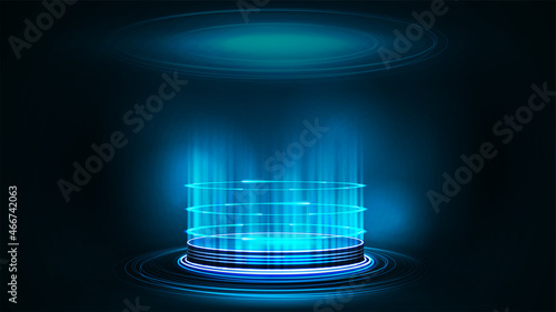 Empty blue digital hologram podium with particles and shiny rings in dark room. Dark and blue digital scene