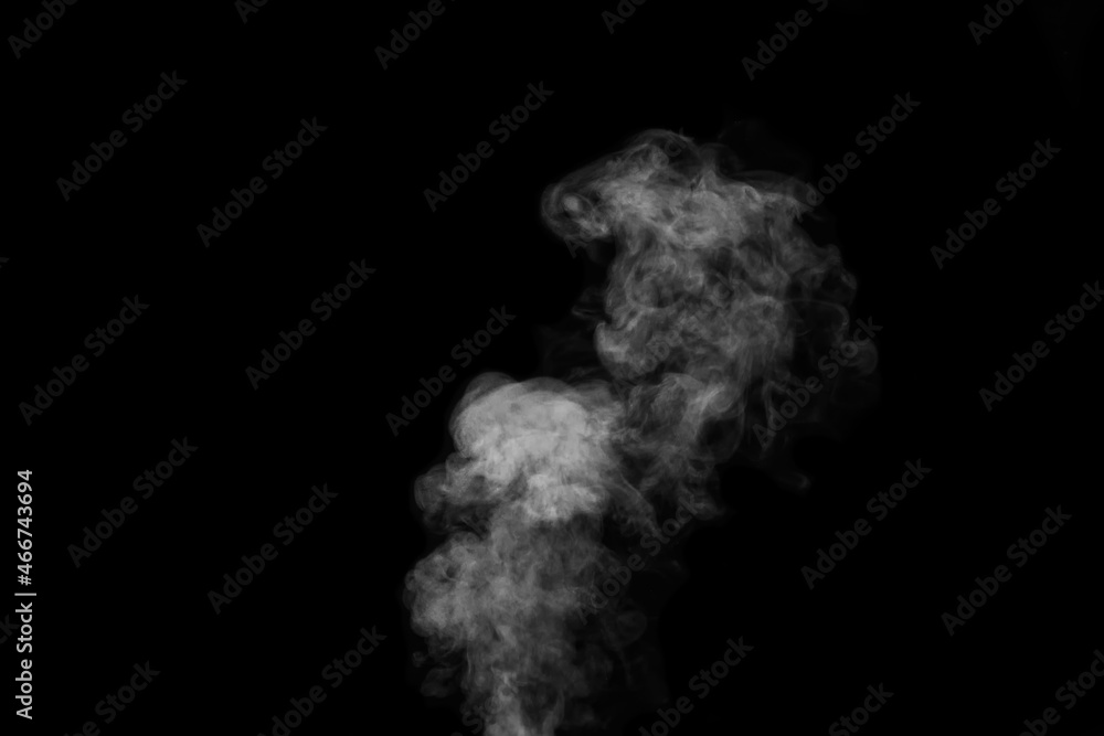 Curly white steam, Fog or smoke isolated transparent special effect on black background. Abstract mist or smog background, design element for your image, Layout for collages. Curly white steam, Fog or smoke isolated transparent special effect on black background. Abstract mist or smog background, design element for your image, Layout for collages.