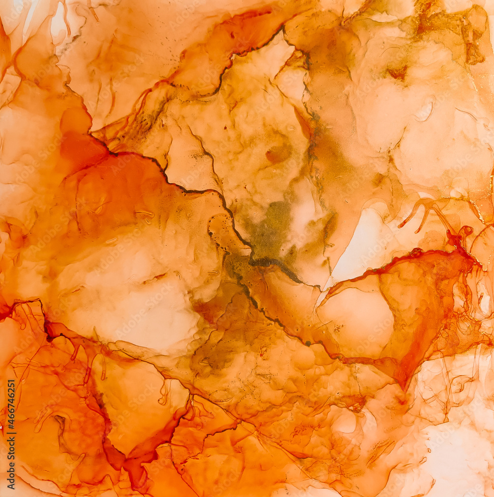 Background texture of alcohol ink in red and yellow colors.  Abstract  paint with drops and stains.