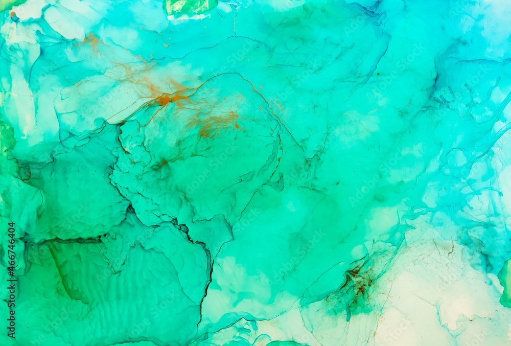 Background texture of alcohol ink in blue and green  colors.  Abstract  paint with drops and stains.