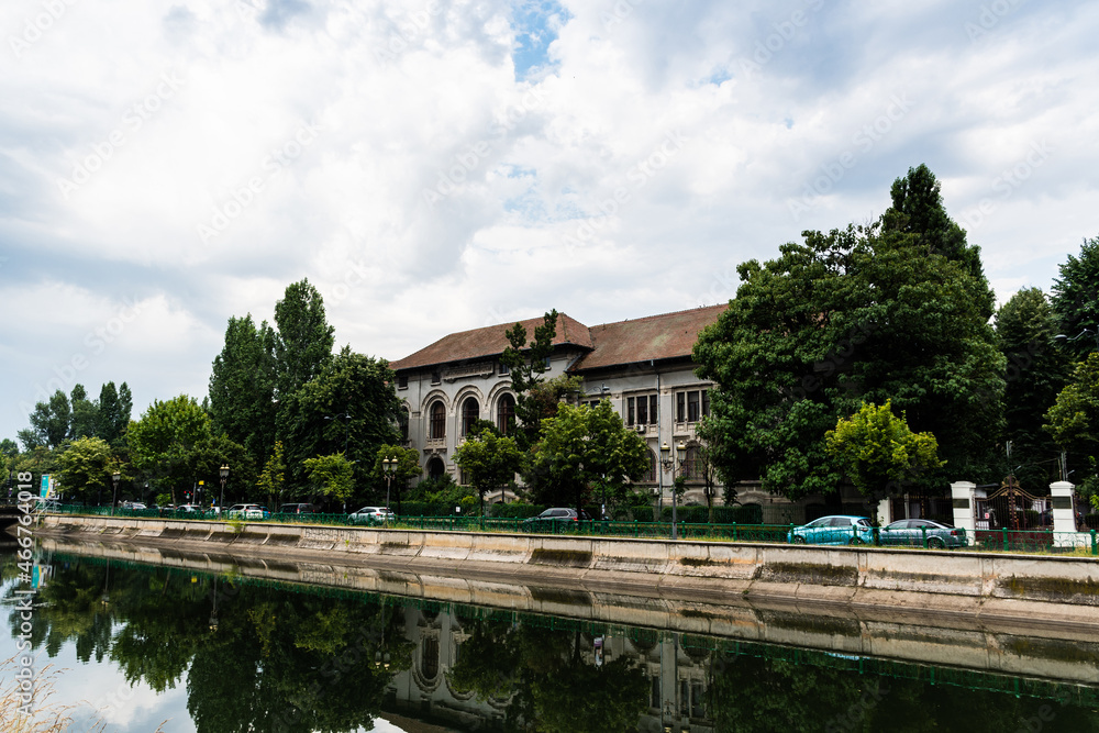 Landscape with the Dambovita river and the Faculty of Biology of the University of Bucharest. Romania.