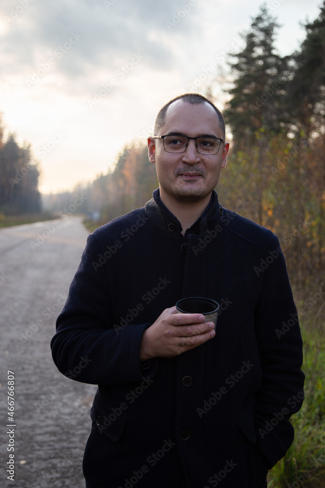 a man in the forest with tea a man in the forest with tea