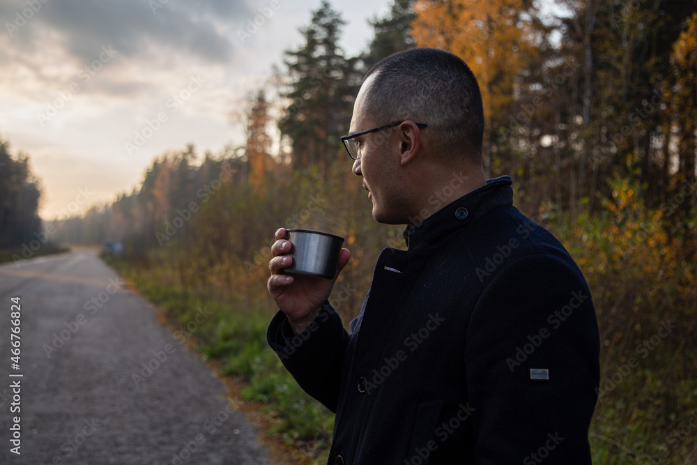 a man in the forest with tea a man in the forest with tea