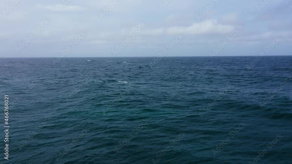 Dark blue sea and sky with clouds. Seascape, tropical sea. Dark blue sea and sky with clouds. Seascape, tropical sea.