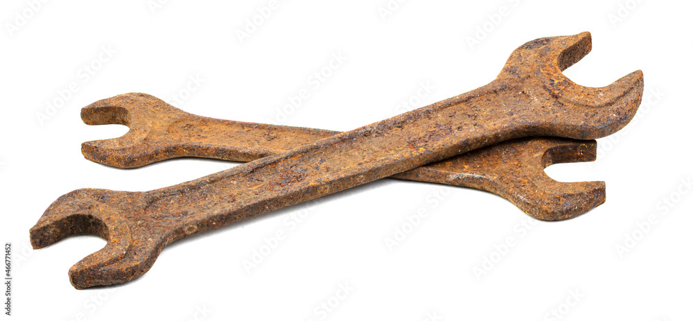 Old rusty wrenches on a white background