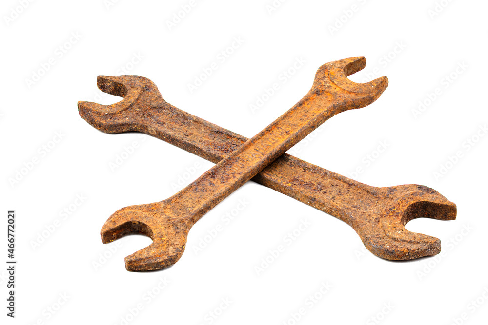 Old rusty wrenches on a white background