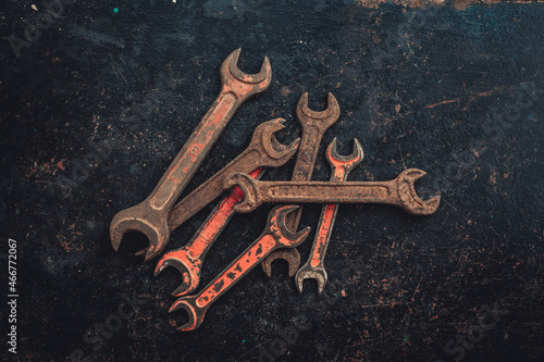 Fototapeta Naklejka Na Ścianę i Meble -  Old wrenches on a dark background