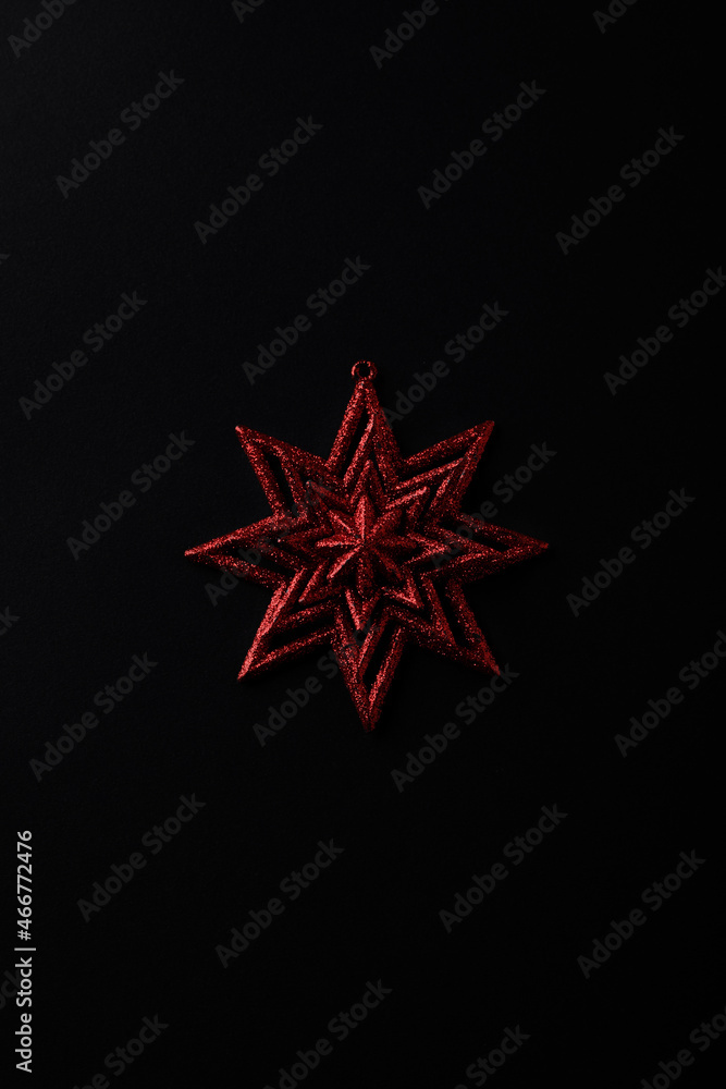 Christmas ornament on dark paper background. Copy space. Christmas ornament on dark paper background. Copy space.