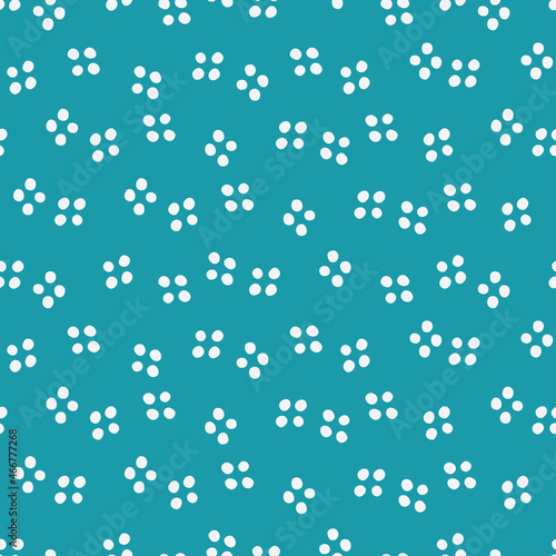 Blue seamless pattern with white dots.