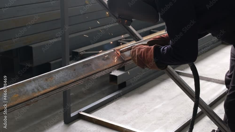 welder, welder man welding steel profile, in workshop welder, welder man welding steel profile, in workshop