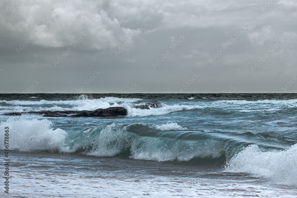 Rough waves rolling in at Atlantic Guincho beach in Portugal Rough waves rolling in at Atlantic Guincho beach in Portugal