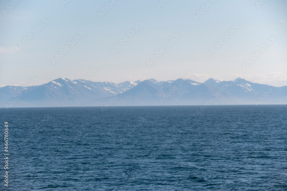 Landscape of snow covered mountains in fjord in North Iceland Landscape of snow covered mountains in fjord in North Iceland
