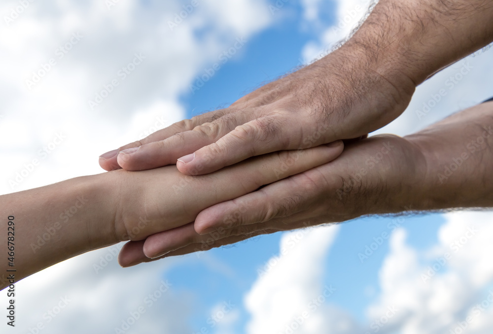 adult hands hold a young hand. concept Council , care, love adult hands hold a young hand. concept Council , care, love