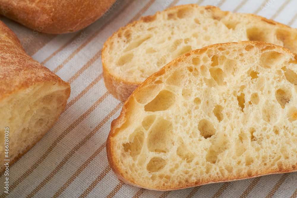 ciabatta is an Italian white bread made from wheat flour water salt yeast olive oil on white background