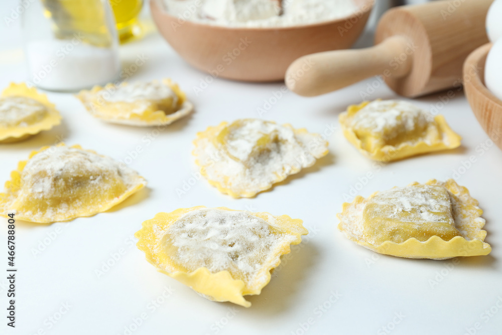 Concept of cooking ravioli on white background Concept of cooking ravioli on white background