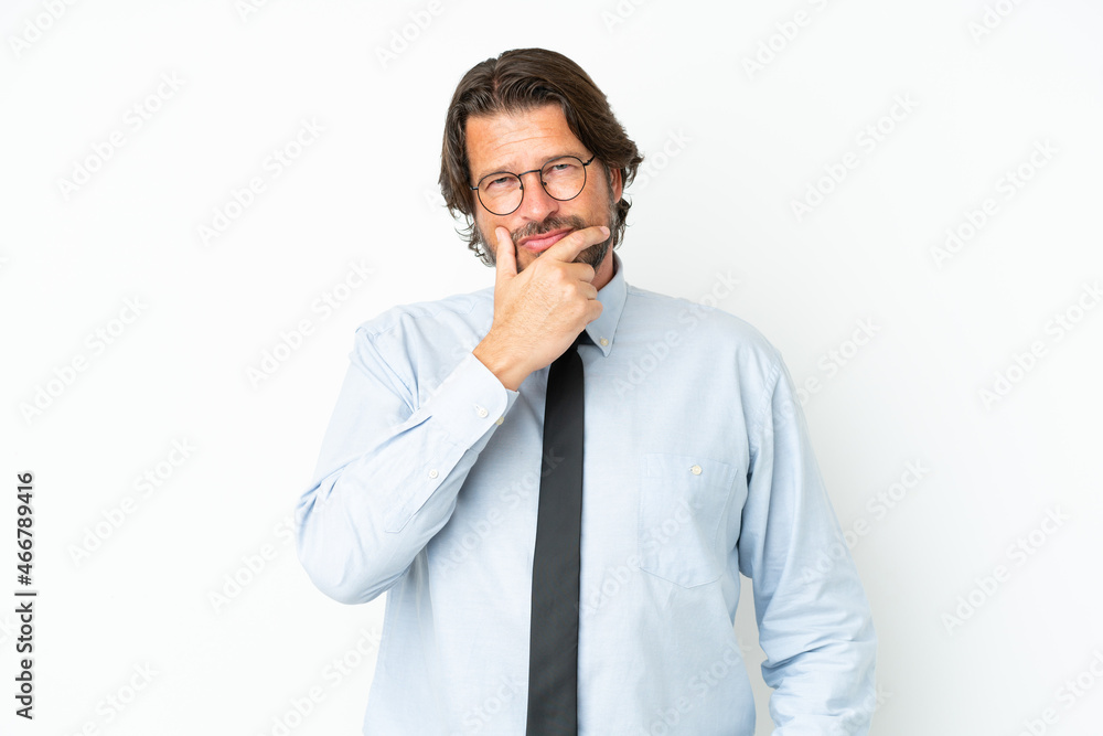 Senior dutch business man isolated on white background having doubts and with confuse face expression Senior dutch business man isolated on white background having doubts and with confuse face expression