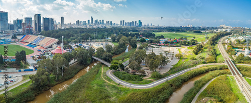 Panoramic aerial view of park Hayarkon along the river and Tel Aviv city in background, Tel-Aviv, Israel. photo