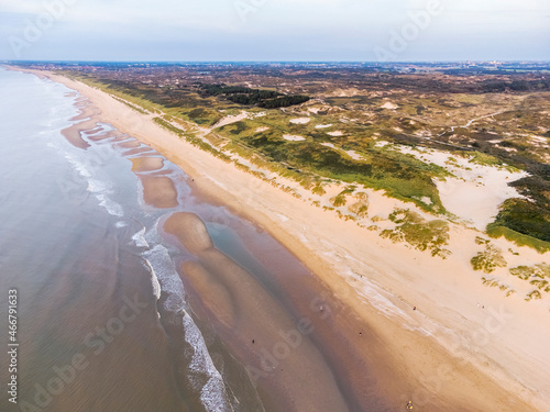 Aerial view of dunes Hollands Duin and North Sea during low tide, Wassenaarse Slag, Wassenaar, Netherlands. photo