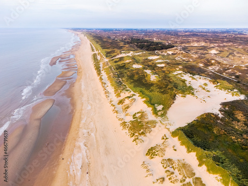 Aerial view of dunes Hollands Duin and North Sea during low tide, Wassenaarse Slag, Wassenaar, Netherlands. photo