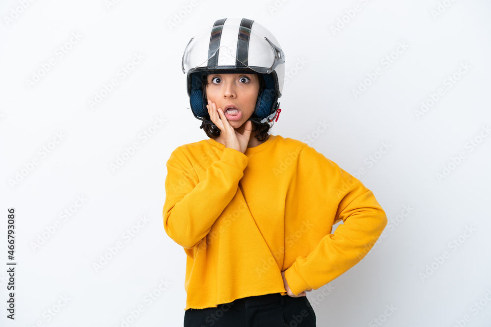 Woman with a motorcycle helmet surprised and shocked while looking right Woman with a motorcycle helmet surprised and shocked while looking right