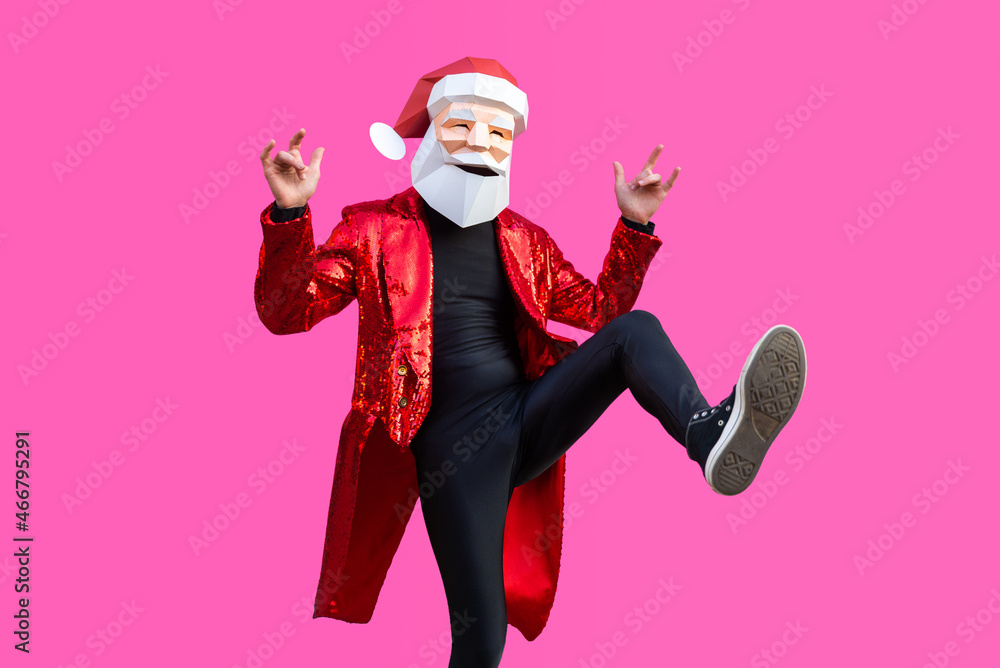Man with funny low poly Santa Claus mask on colored background Man with funny low poly Santa Claus mask on colored background