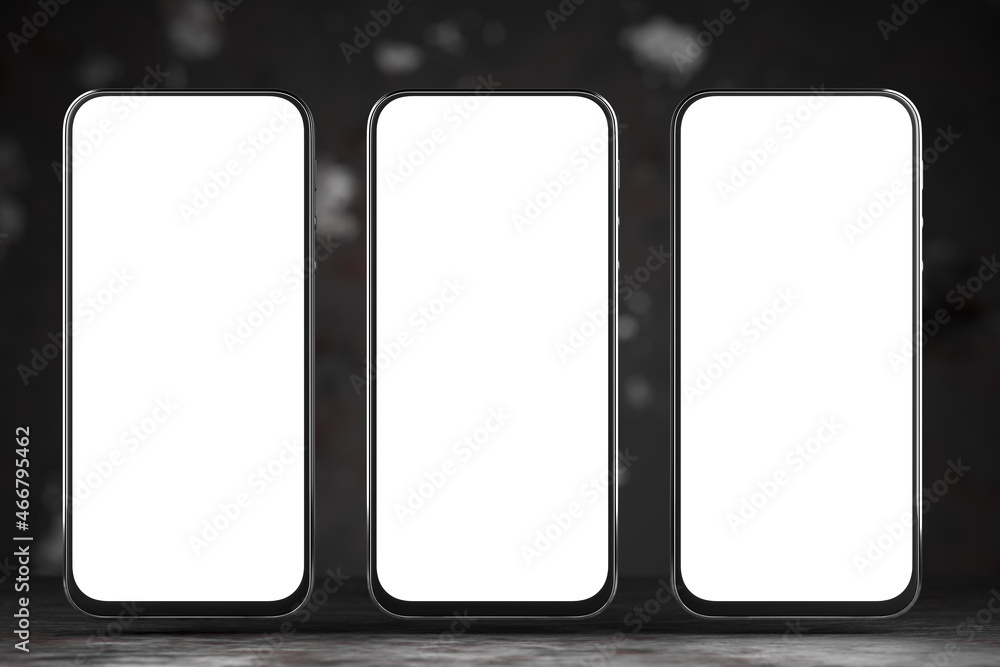 Three smartphones with a white screen. Smartphone mockup for your design. 3d renderer. Three smartphones with a white screen. Smartphone mockup for your design. 3d renderer.