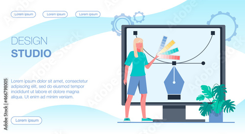 A girl holding a palette of colors in a design studio