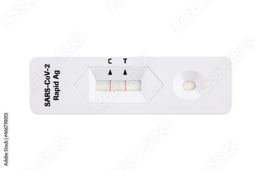 Positive covid test. Test results for Covid-19. rapid test on a white background. SARS-CoV-2 Ag Rapid Antibody Test Kit. Nasopharyngeal swab. Close-up. photo