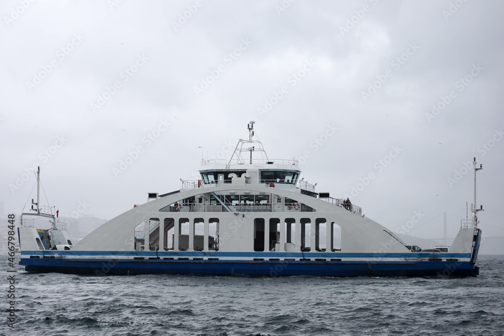 passenger ferry crosses the Bosporus strait in Istanbul, Turkey in stormy and rainy day passenger ferry crosses the Bosporus strait in Istanbul, Turkey in stormy and rainy day