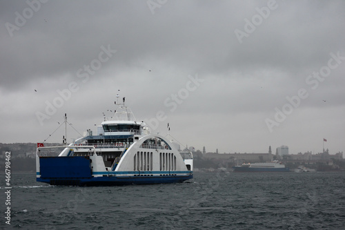 passenger ferry crosses the Bosporus strait in Istanbul, Turkey in stormy and rainy day © Sergei Timofeev