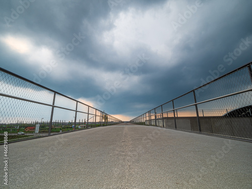 Ingolstadt Landesgartenschau Bridge with massive clouds 