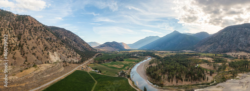 Aerial View of Scenic Road, Hwy 3, in the valley around the Canadian Mountain Landscape. Near Osoyoos, British Columbia, Canada. Panorama