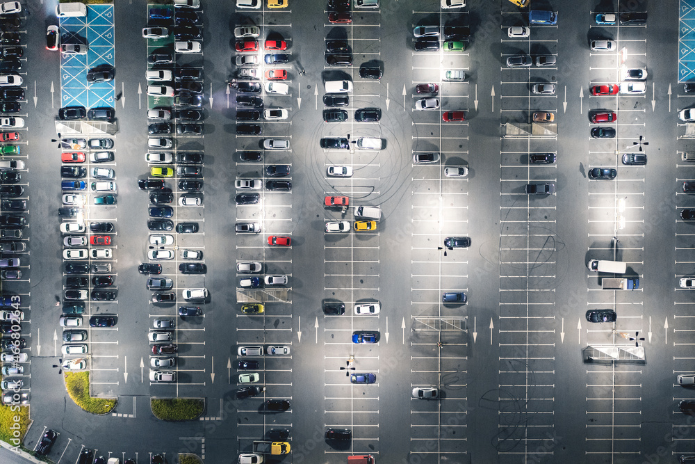 Large car park at night from a height Large car park at night from a height
