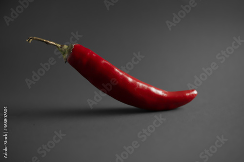 red hot pepper on a black background