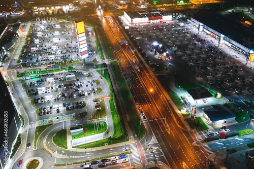 Night parking near shopping centers from a bird's eye view
