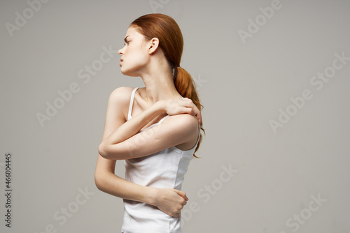 disgruntled woman rheumatism pain in the neck health problems studio treatment