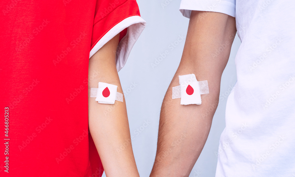 Giving blood saves lives. Blood donation. Man and woman blood donors