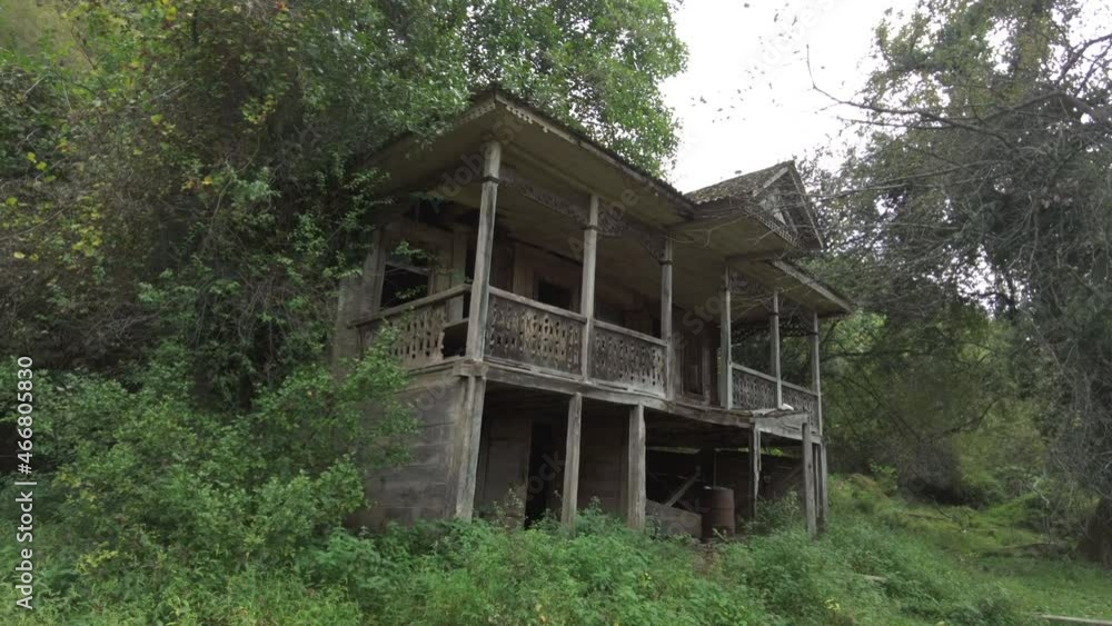 Old abandoned wooden house standing in the forest Old abandoned wooden house standing in the forest