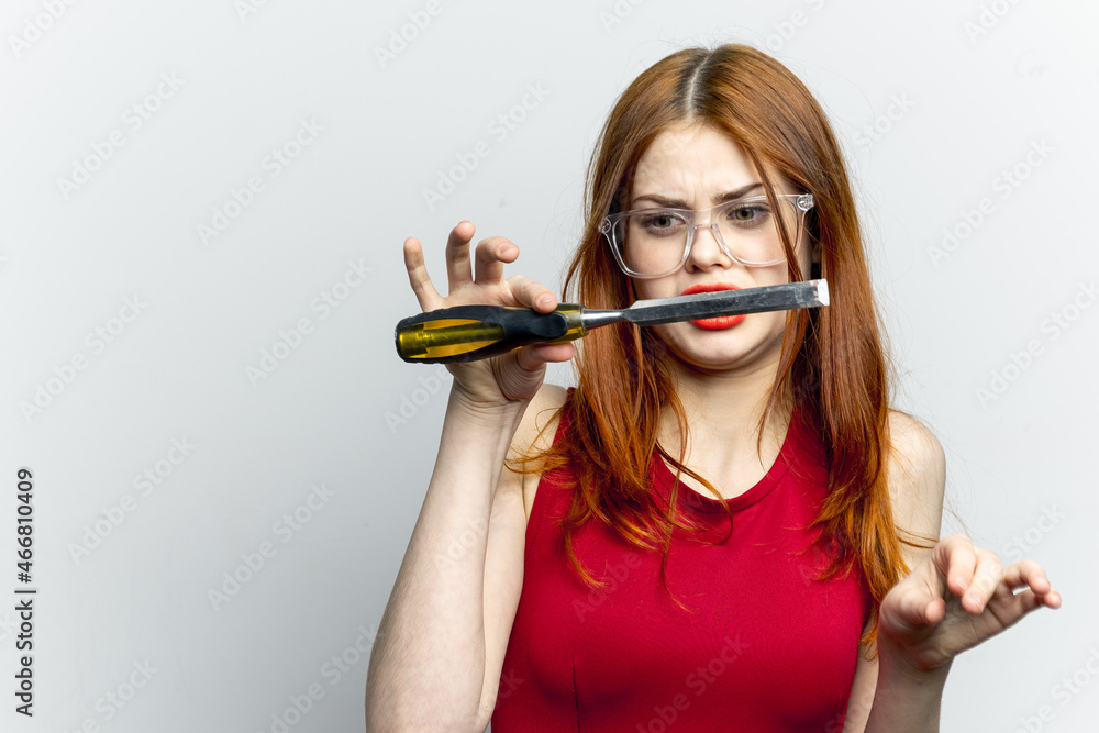 Woman in red t-shirt brush for paint rendering of repair service Woman in red t-shirt brush for paint rendering of repair service